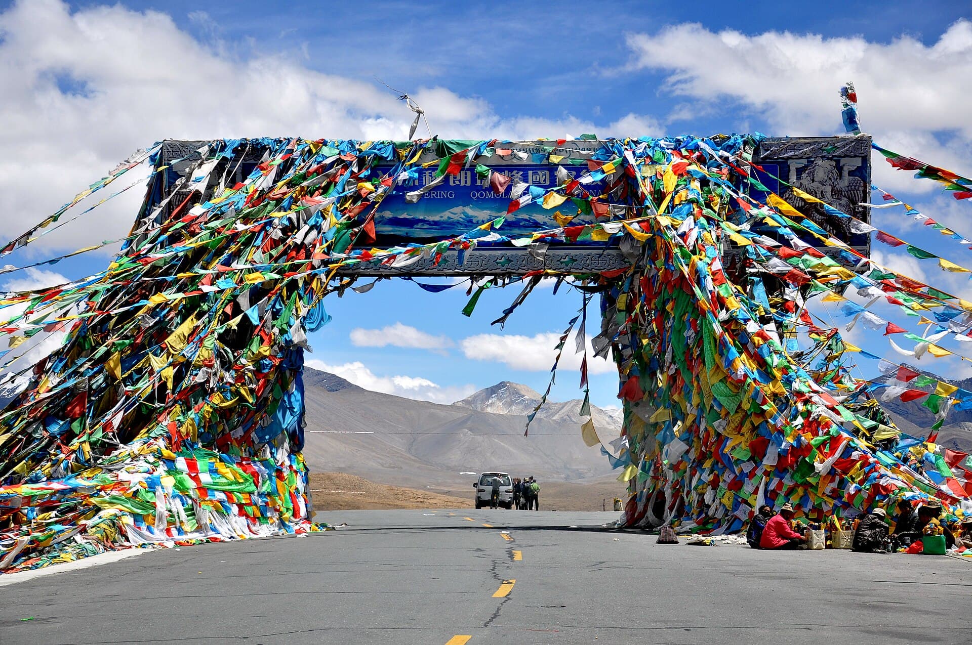 Prayer flags strung across a high mountain pass